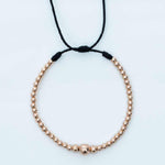 Pulsera tejida oro laminado rosa balín #8 #6 centro y #3