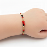 PULSERA PARA BEBÉ TIPO AZABACHE TEJIDA BALÍN #3