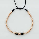 Pulsera tejida oro rosa con balín #6 #4 #3 y neopreno doble cinta