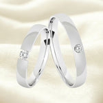 Argollas liso brillante zircon centro suizo blanco 5490